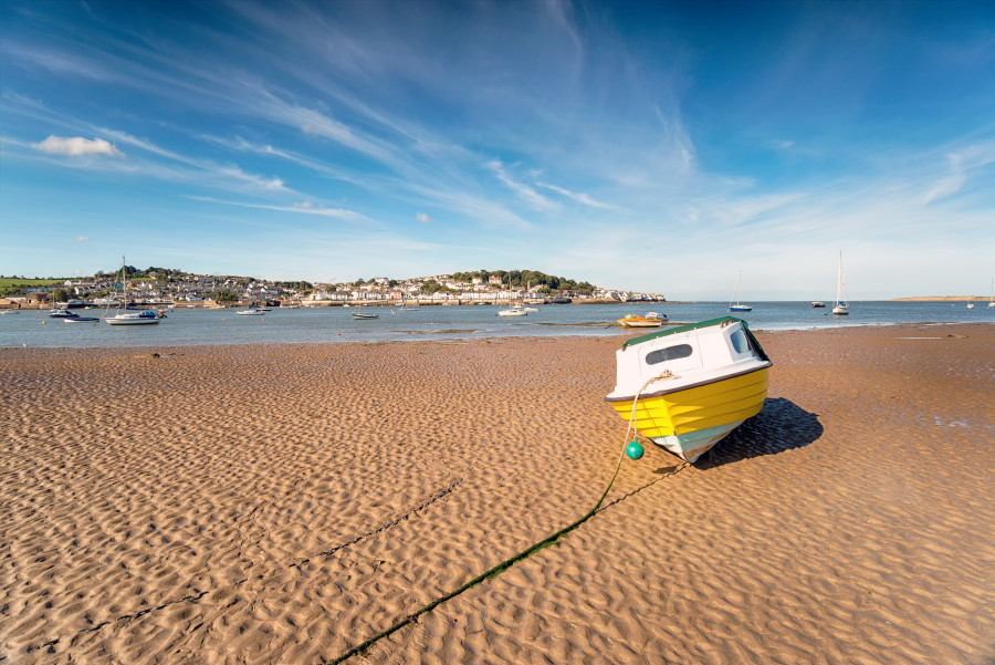 Beached boat on a beach in devon